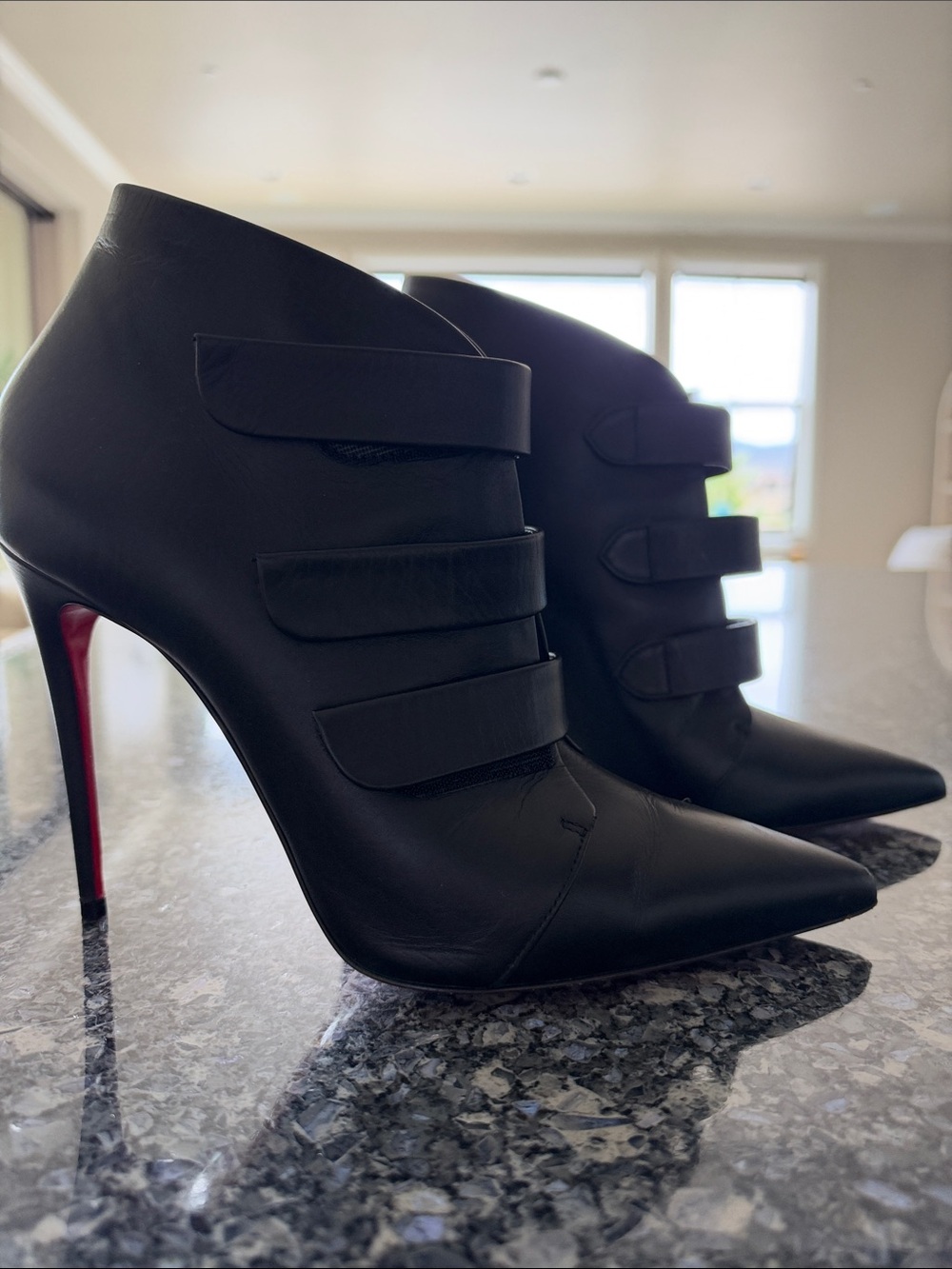 Christian Louboutin Black Leather Pointed Ankle Booties with Red Soles